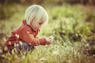 child _picking_a_flower