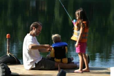 father children fishing