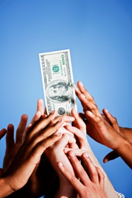 hands_reaching_for_money