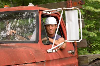 young man in truck