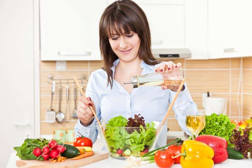 woman making salad