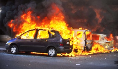 cars burning riots