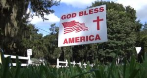 City Bans Homeowners’ ‘God Bless America’ Signs Before Backtracking