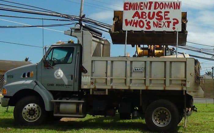 eminent domain sign bulldoze