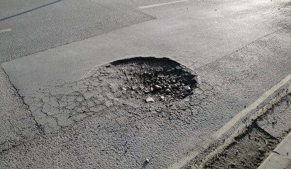 Masked Vigilantes Are Repairing A City’s Potholes – And Officials Are Upset