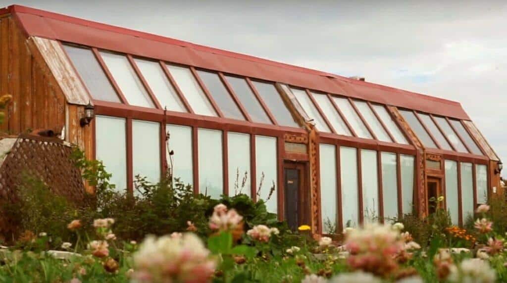 His Off-Grid Home Is Made Of 1,000 Tires (& Other Recycled Stuff) 