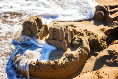 Boy Scout correctness waves sand castles 